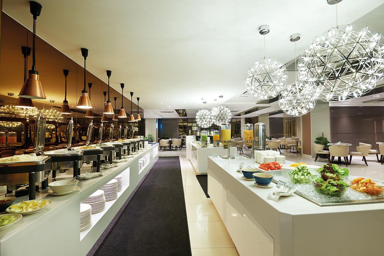 Cosmo Hotel Куала-Лумпур Экстерьер фото