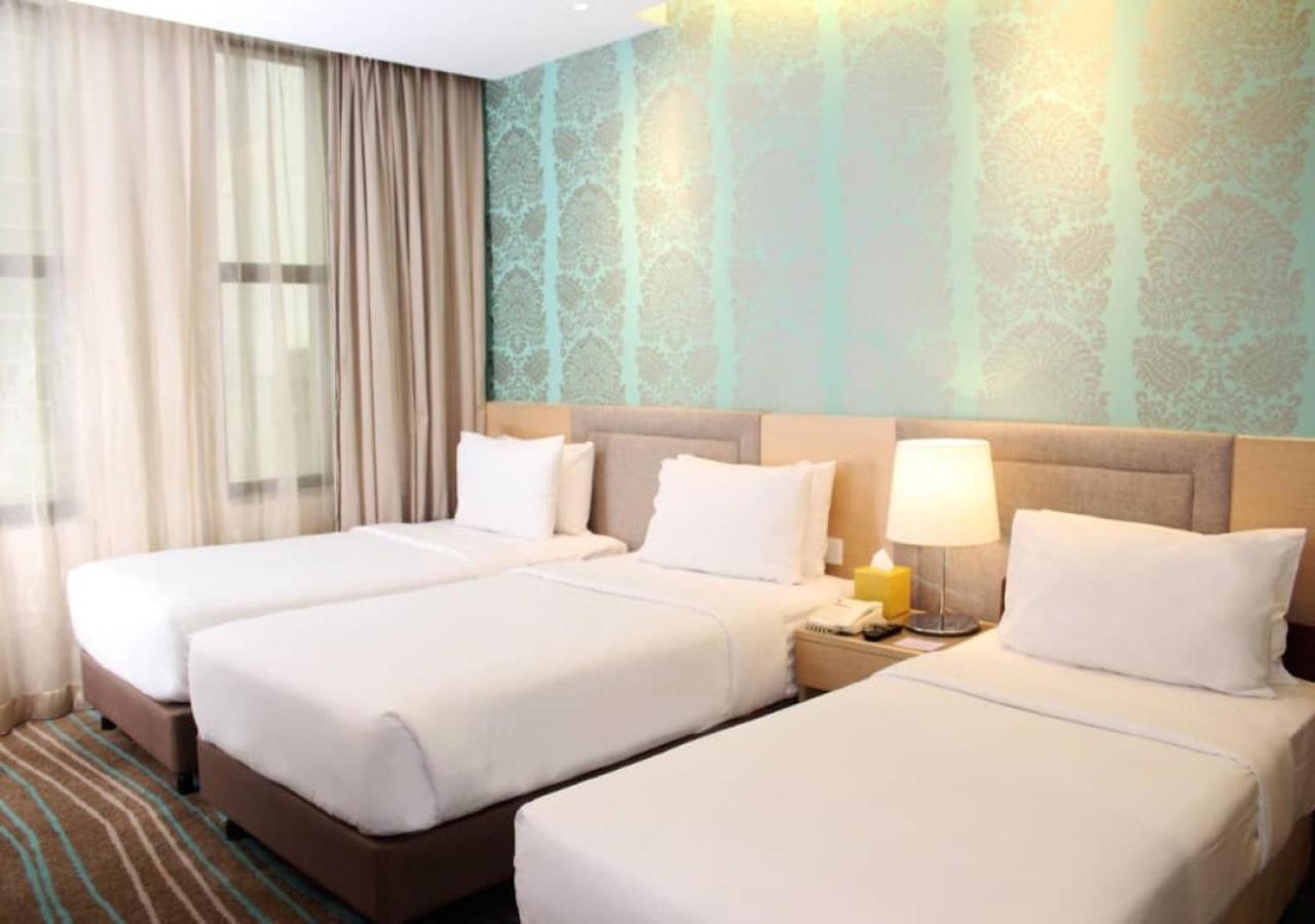 Cosmo Hotel Куала-Лумпур Экстерьер фото